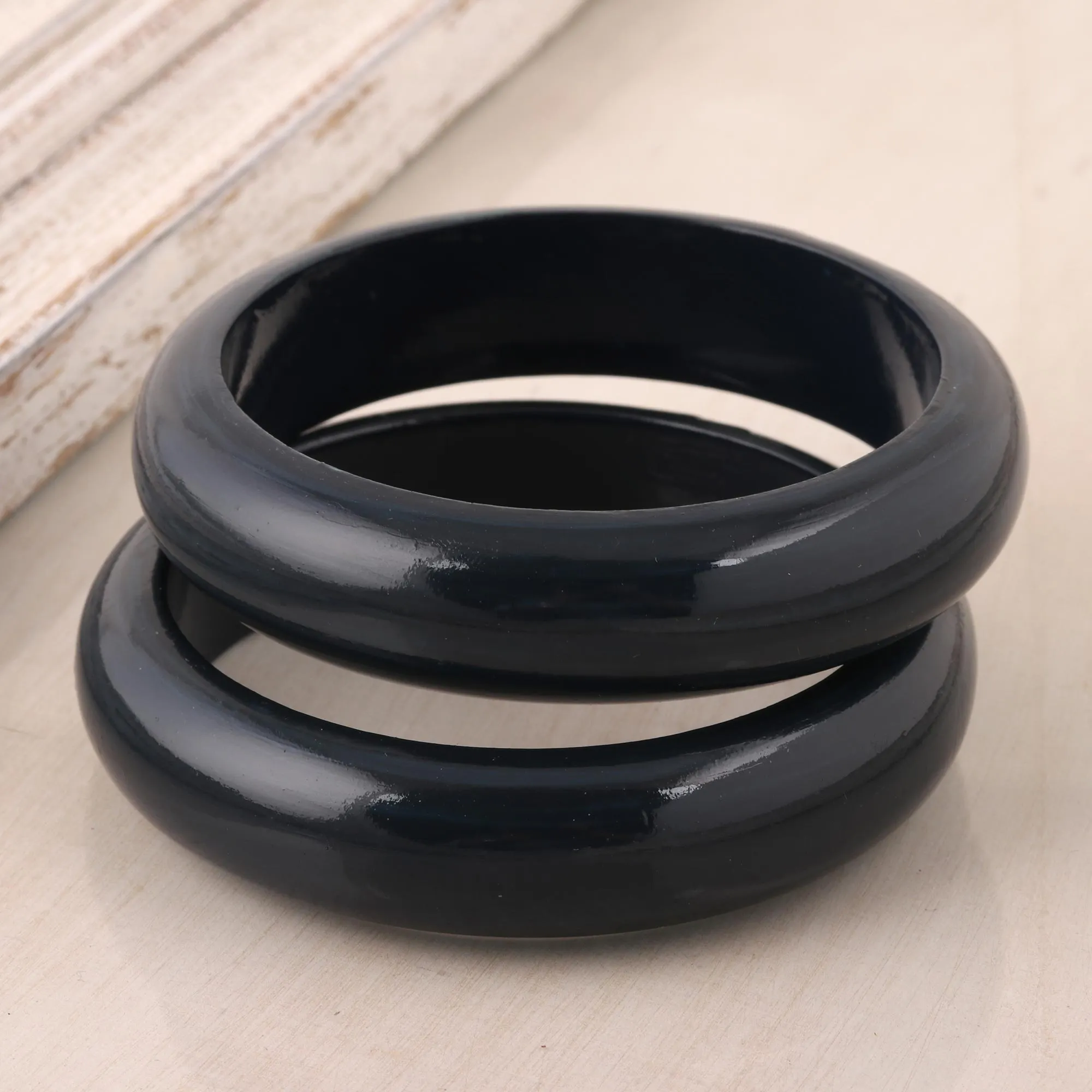 Haldu Wood Bangle Bracelets in Charcoal from India (Pair) - Charcoal Duo | NOVICA