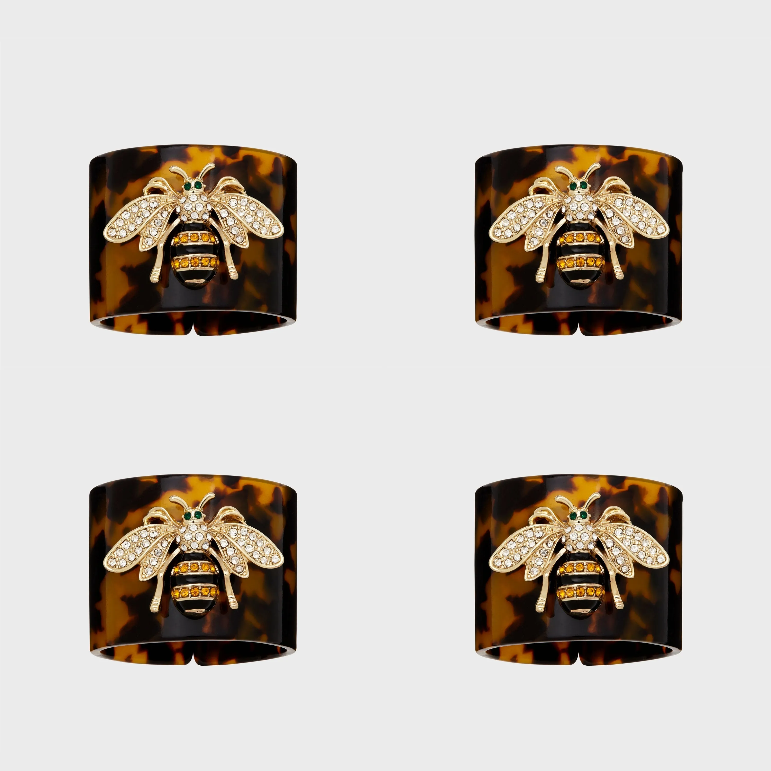 Stripey bee resin napkin rings, tortoiseshell, set of four